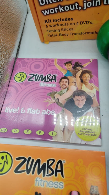 Zumba Fitness Total Body Transformation System 4 DVDs Toning Sticks Guide 2010